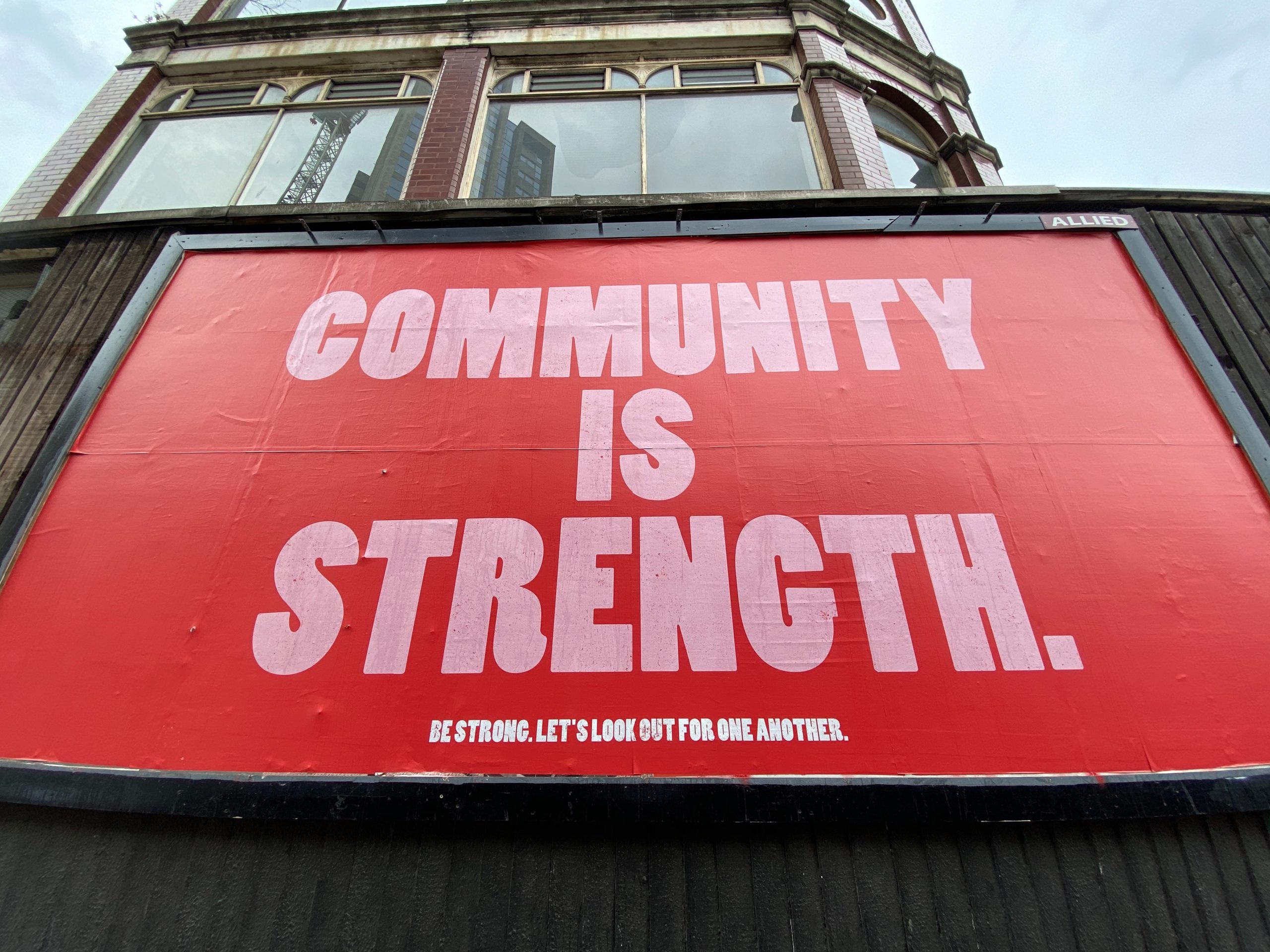 'community is strength' poster